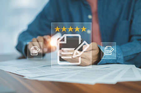 Customer survey quality review ,Businessman give rating to service experience on online application, Customer review satisfaction feedback survey concept, Customer can evaluate quality of serviceの写真素材