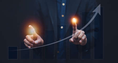 business growth people, Businessman pointing arrow graph on chart, Business corporate growth plan and business development to success and growing growth conceptの写真素材