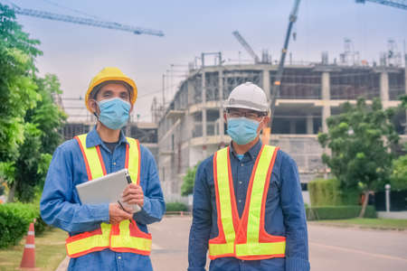 Team engineer Two man architect on a building construction siteの写真素材
