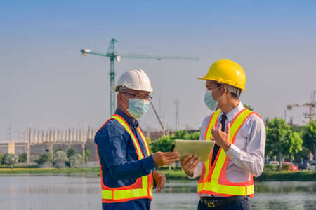 Team engineer Two man architect on a building construction siteの写真素材