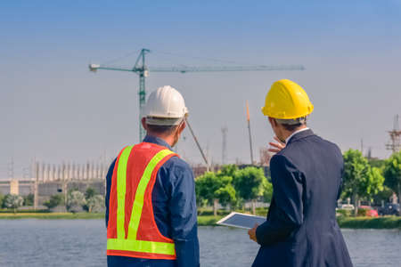Team engineer Two man architect on a building construction siteの写真素材