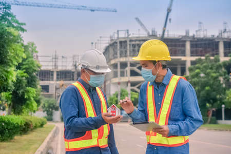 Team engineer Two man architect on a building construction siteの写真素材