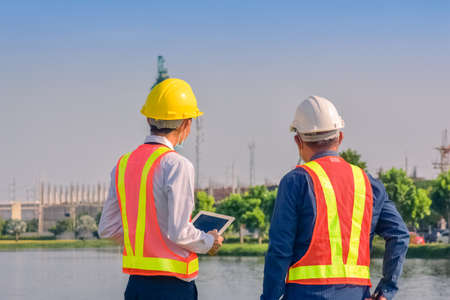 Team Asian man architect on a building construction siteの写真素材