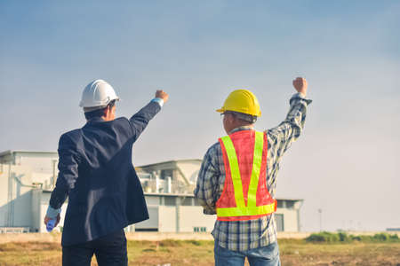 Team engineer Two man architect on a building construction siteの写真素材