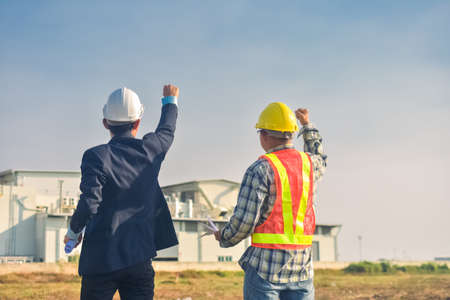 Team engineer Two man architect on a building construction siteの写真素材
