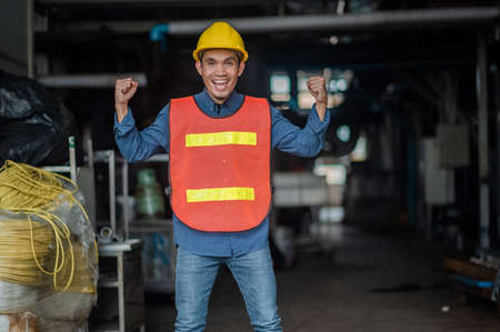Asia Engineer standing pose Confident , Asian man engineer are working in factory production industrialの写真素材
