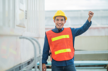 Asia Engineer standing pose Confident , Asian man engineer are working in factory production industrialの写真素材