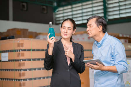 Factory manager talking with quality control team in food factory for food quality business export to customerの写真素材