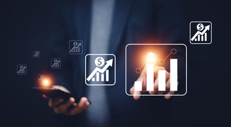 Business man trader investor analyst using mobile phone app analytics for cryptocurrency financial market analysis, trading data index chart graph on smartphoneの写真素材