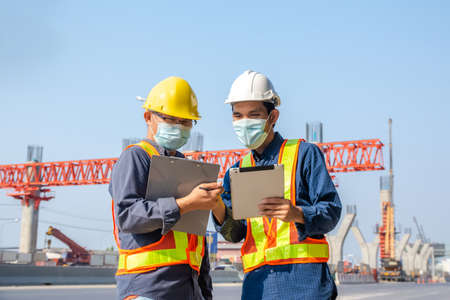 Team engineer Two man architect on a building construction siteの写真素材