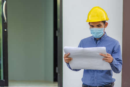 Asian Engineer construction are worker employee working by safety control helmet on site buildingの写真素材