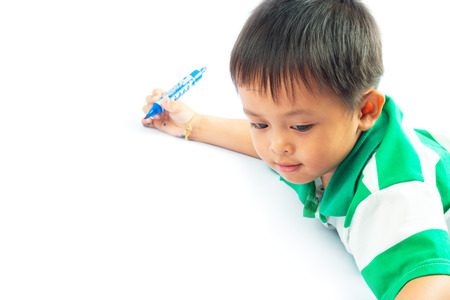 Little boy on a floor with a diary  Isolated over white background の写真素材