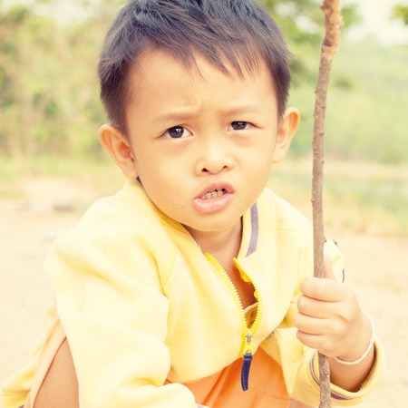 Little boy  with retro filter effectの写真素材