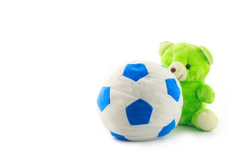 ball toy and green bear for kids made from synthetic fabrics(isolated on white)の写真素材