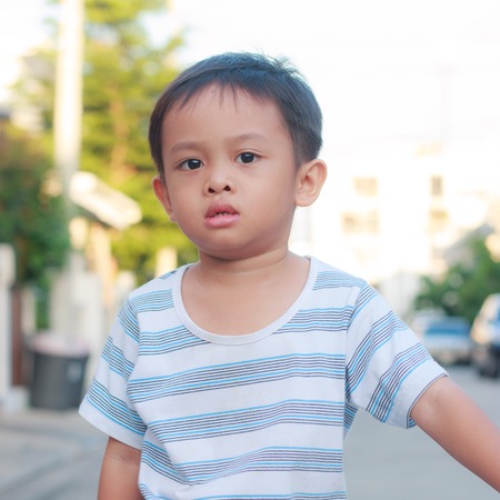 asian kid on bikeの写真素材