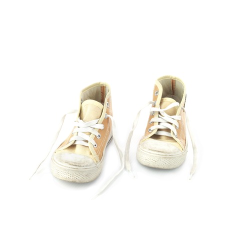 Kid shoes isolate on whiteの写真素材