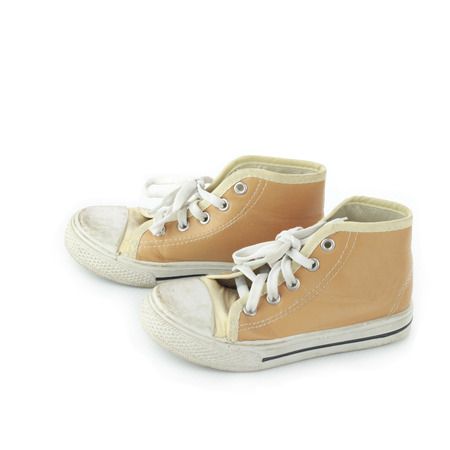 Kid shoes isolate on whiteの写真素材