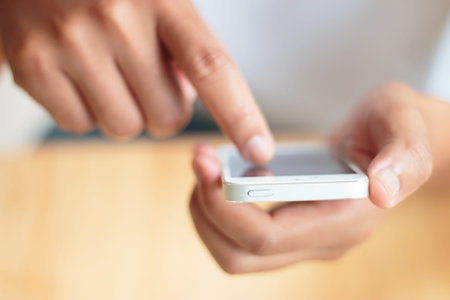 Man using smart phone