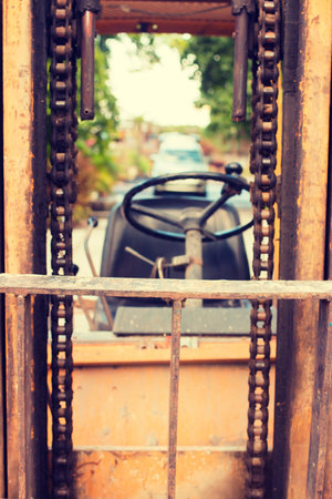 Yellow old folk lift truckの写真素材