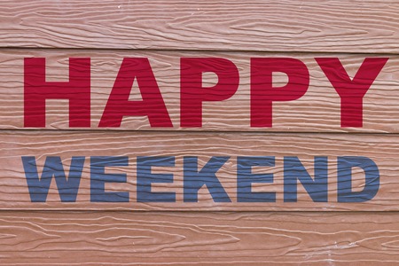 Happy weekend on wooden backgroundの写真素材