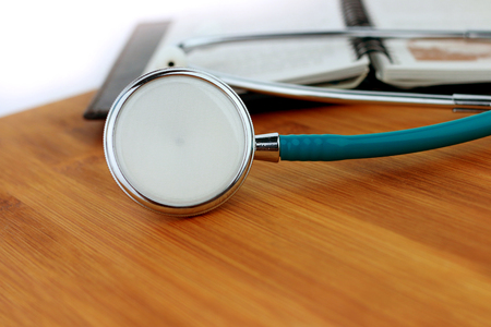 Stethoscope  on a wood backgroundの写真素材