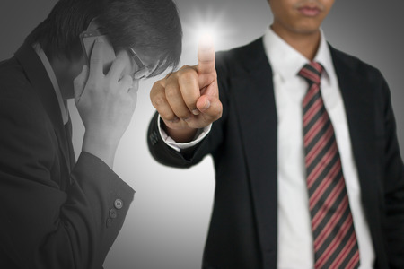 Businessmen do something in secret.の写真素材