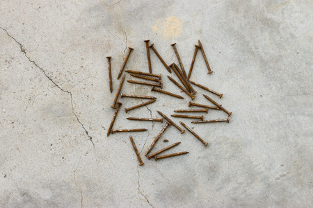 Nail on concrete backgroundの写真素材