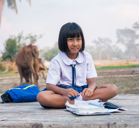 Asian girl student In the countrysideの写真素材