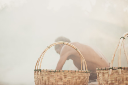 Fisherman with wicker toolsUncle Asian fisherman with wicker tools.の写真素材