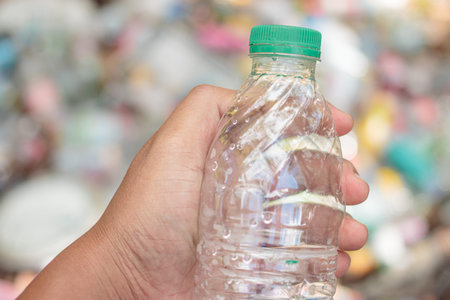 Hand Hold Show Recyclable Plastic for recycling concept reuse.