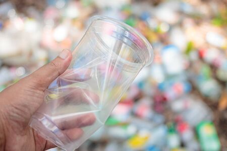 Hand Hold Show Recyclable Plastic for recycling concept reuse.の写真素材