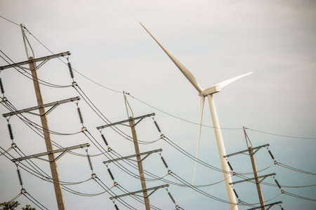 Wind turbine farm power generator in beautiful nature landscape for production of renewable green...