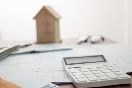 Real estate finance concept concerning mortgage loan offer and house insurance.の写真素材