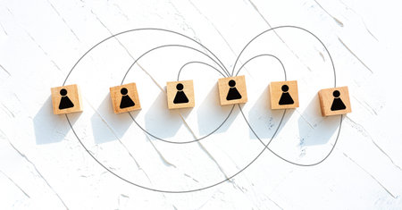 Teamwork and communication concept, rectangular wooden blocks on a white wooden table