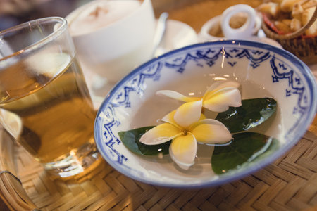Cappuccino coffee served in a Thai style coffee shopの写真素材