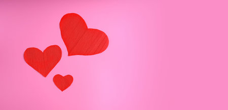 Valentine's Day background. Gifts, confetti, Valentines day concept. Flat lay, top view, copy space, Banner background.の写真素材