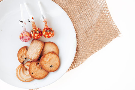 Butter cookies in a white plate on a white background.の写真素材