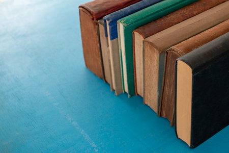 Old books on a blue-green wooden.の写真素材
