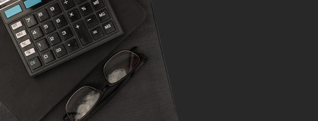 Top view calculator and documents for working on the table, Finance and savings, Business concept.