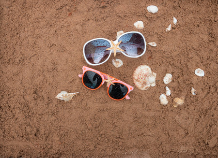 Summer beach sea accessories on sand beach, Summer background Holiday vacation travel conceptの写真素材
