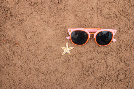 Summer beach sea accessories on sand beach, Summer background Holiday vacation travel concept
