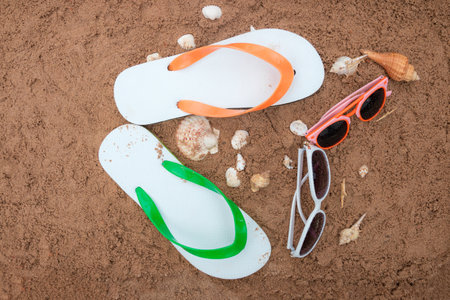 Summer beach sea accessories on sand beach, Summer background Holiday vacation travel conceptの写真素材