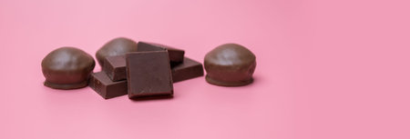Valentine dark chocolate on pink background, Valentines Day Theme, Banner background