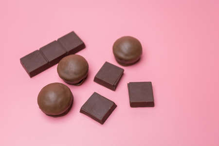 Valentine dark chocolate on pink background, Valentines Day Themeの写真素材