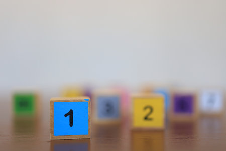 Wooden blocks with numbers, The concept of being a winning person and being a chosen person.の写真素材