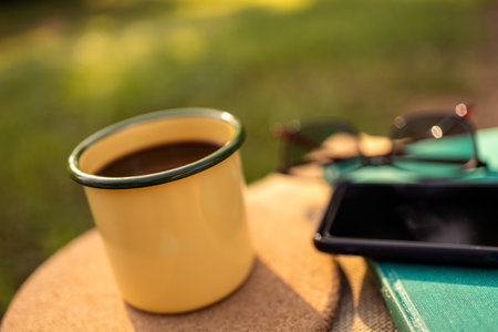 Coffee mugs in the backyard and morning sunshine.の写真素材