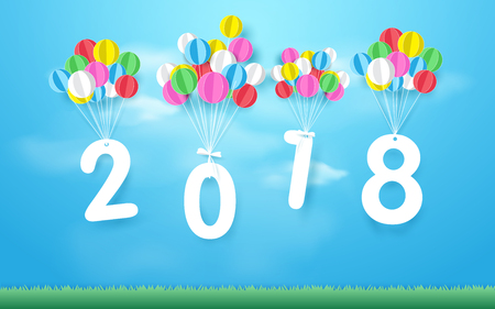 Happy new year 2018 with Colorful balloons flying over grass. Paper art and craft styleのイラスト素材