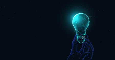 Low poly wireframe hand holding a light bulb. Energy or Creativity concept. Vector illustrationのイラスト素材