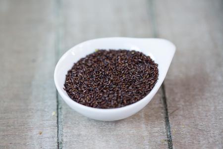 Psyllium in a white bowlの写真素材