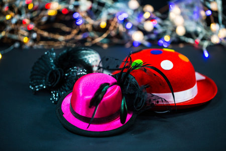 Hats on black background, carnival hats, party hatsの写真素材